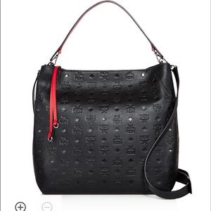 MCM black purse. in great condition